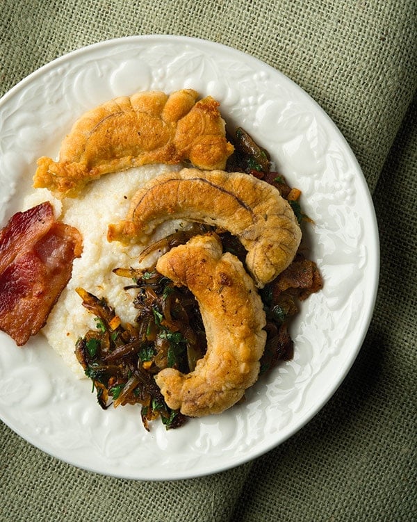 shad roe recipe, served with bacon, grits and greens