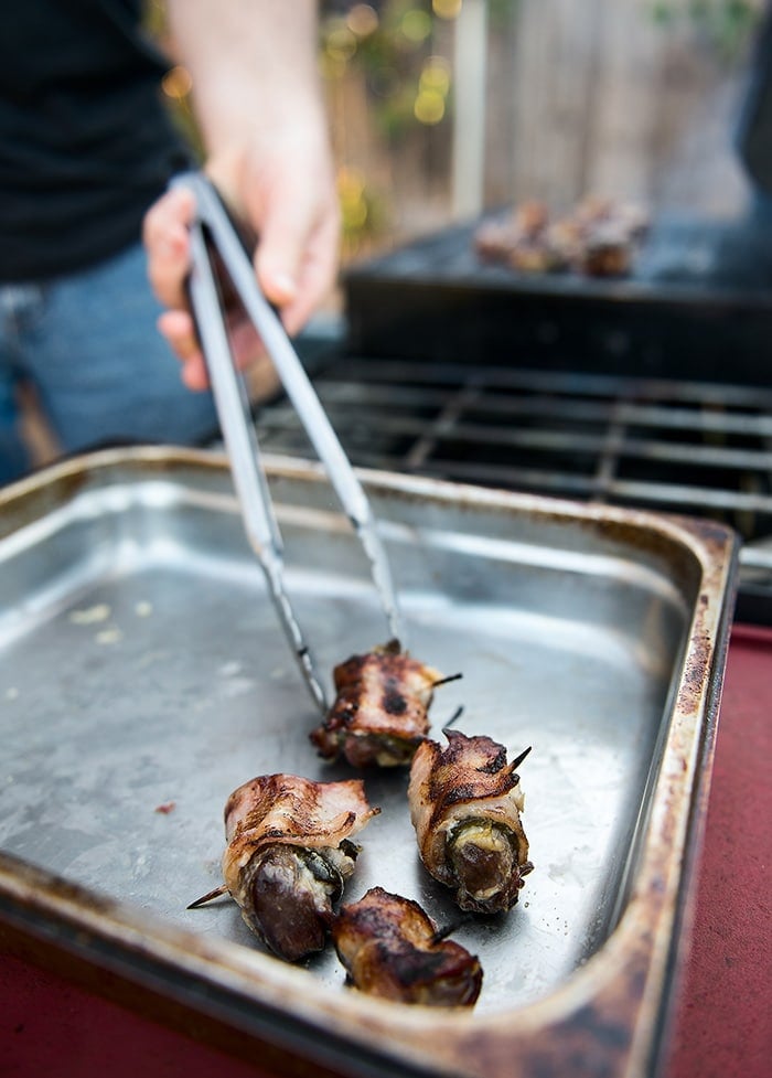 grabbing dove poppers with tongs