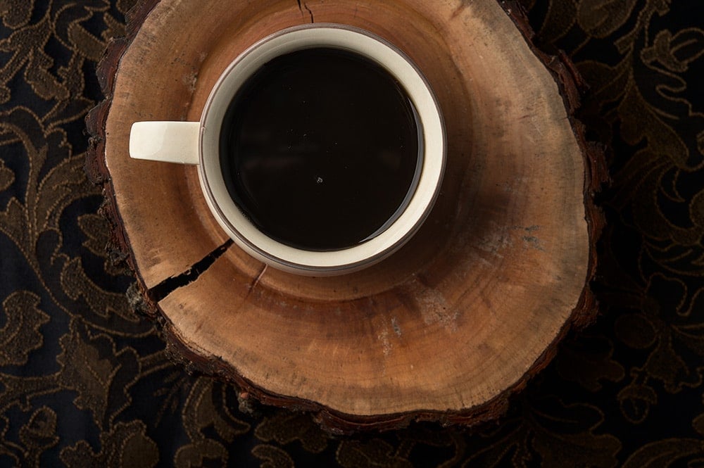 mesquite bean syrup in a cup