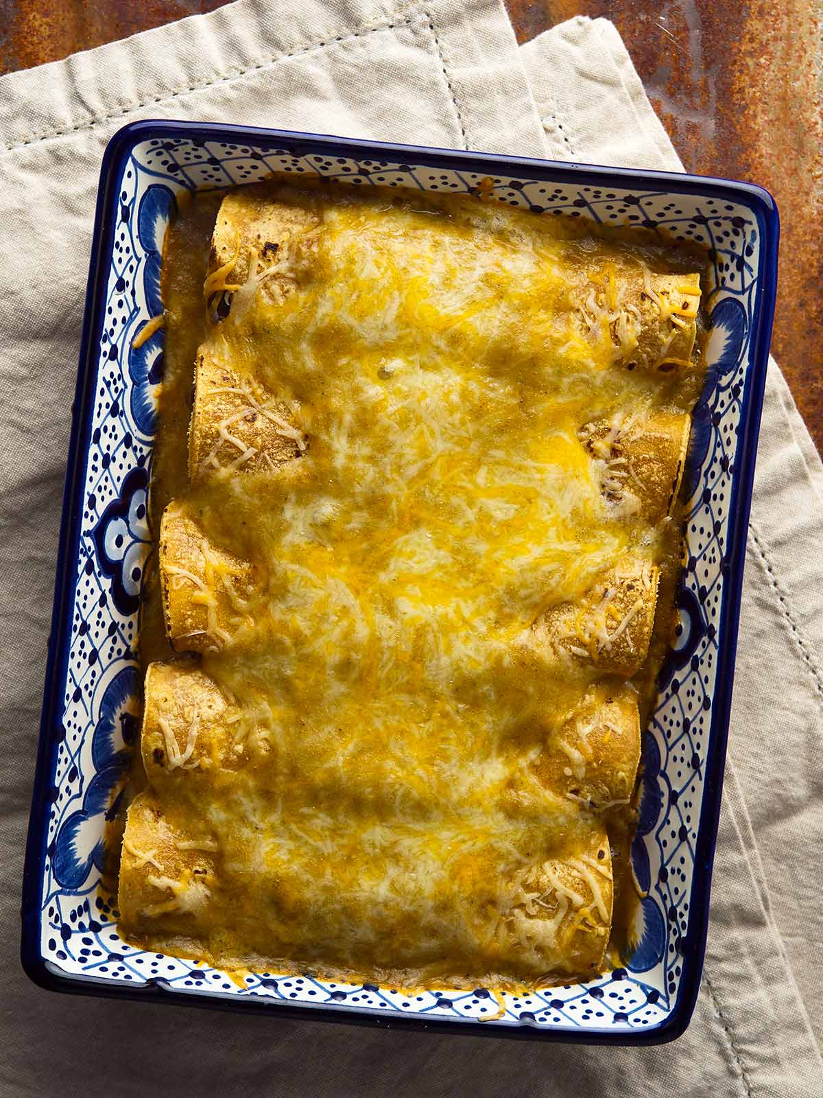 A tray of green chile enchiladas