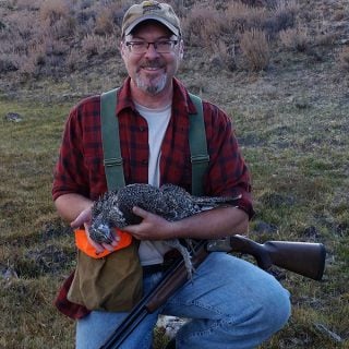 Hank Shaw with a sage grouse