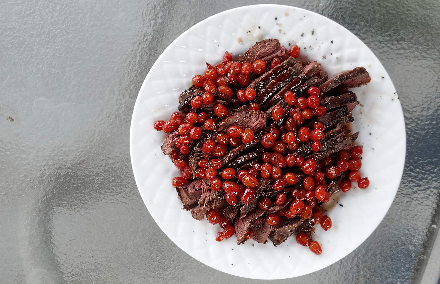 Sage grouse with red currants