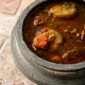 Javelina stew recipe, served in a stone bowl