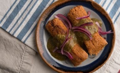 Venison tamales on a plate.