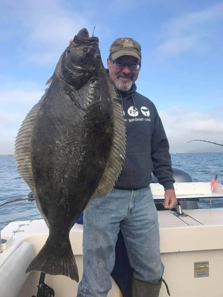 Hank Shaw with a big California halibut