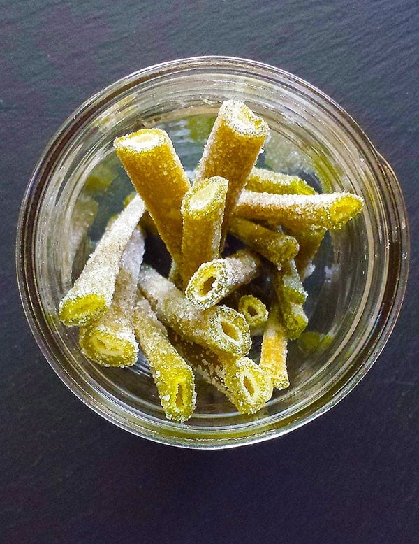 Candied angelica stems in a glass jar. 