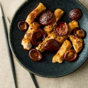 Japanese ginger pork on a plate with chopsticks