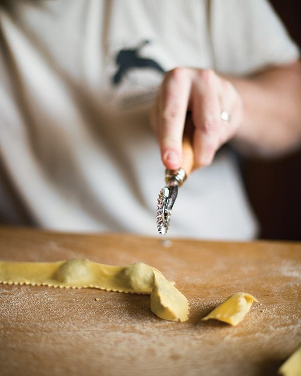 Cutting agnolotti with a rolling blade