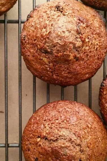 Acorn muffins cooling on a rack.