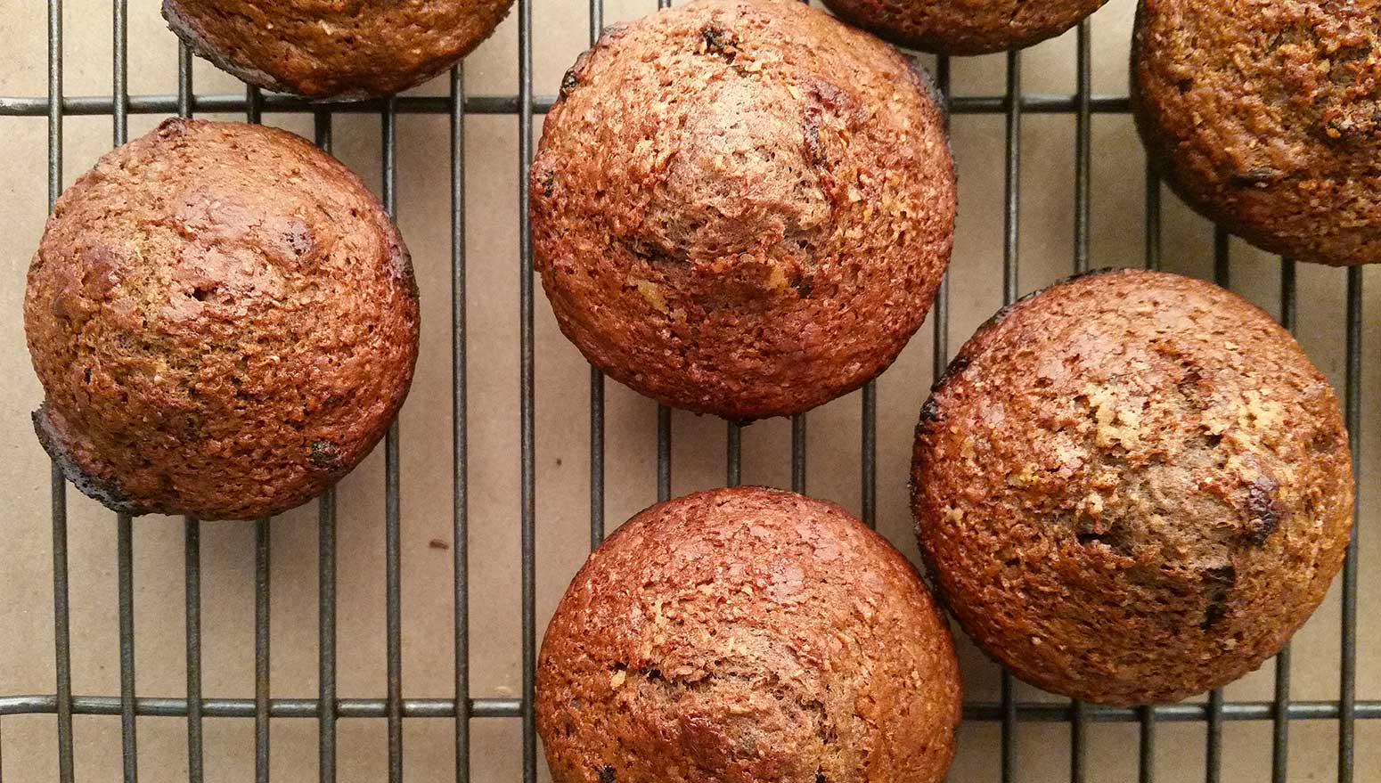 Acorn muffins cooling on a rack. 