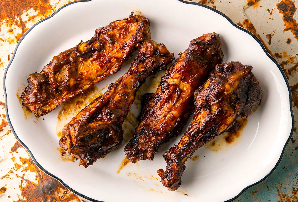 Smoked turkey wings on a platter. 