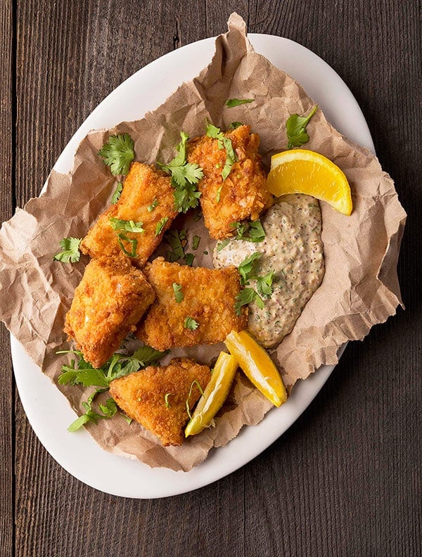 A platter of fried snapper bite with remoulade sauce