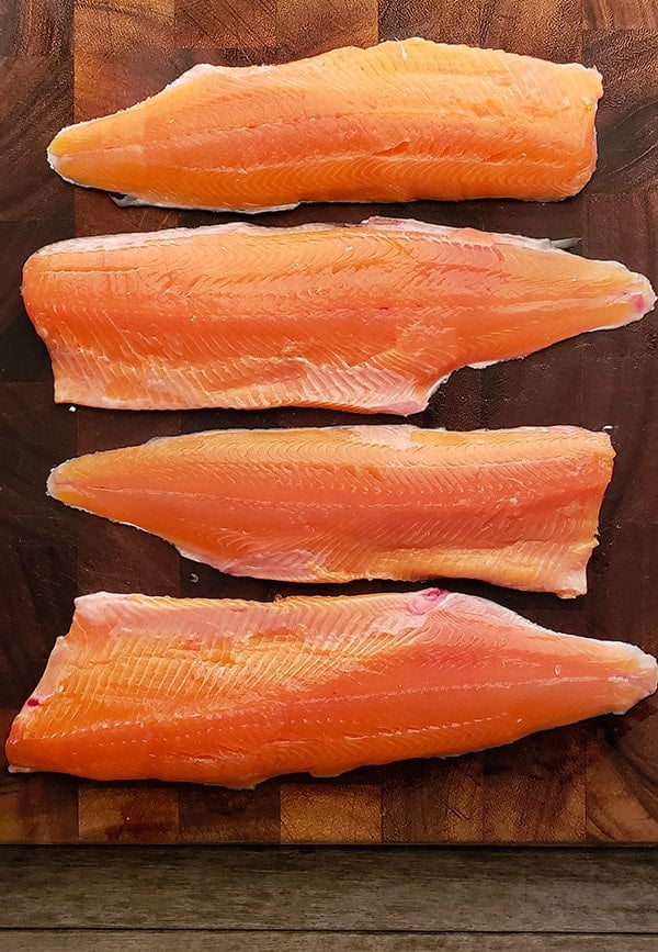 kokanee fillets, arranged on a board