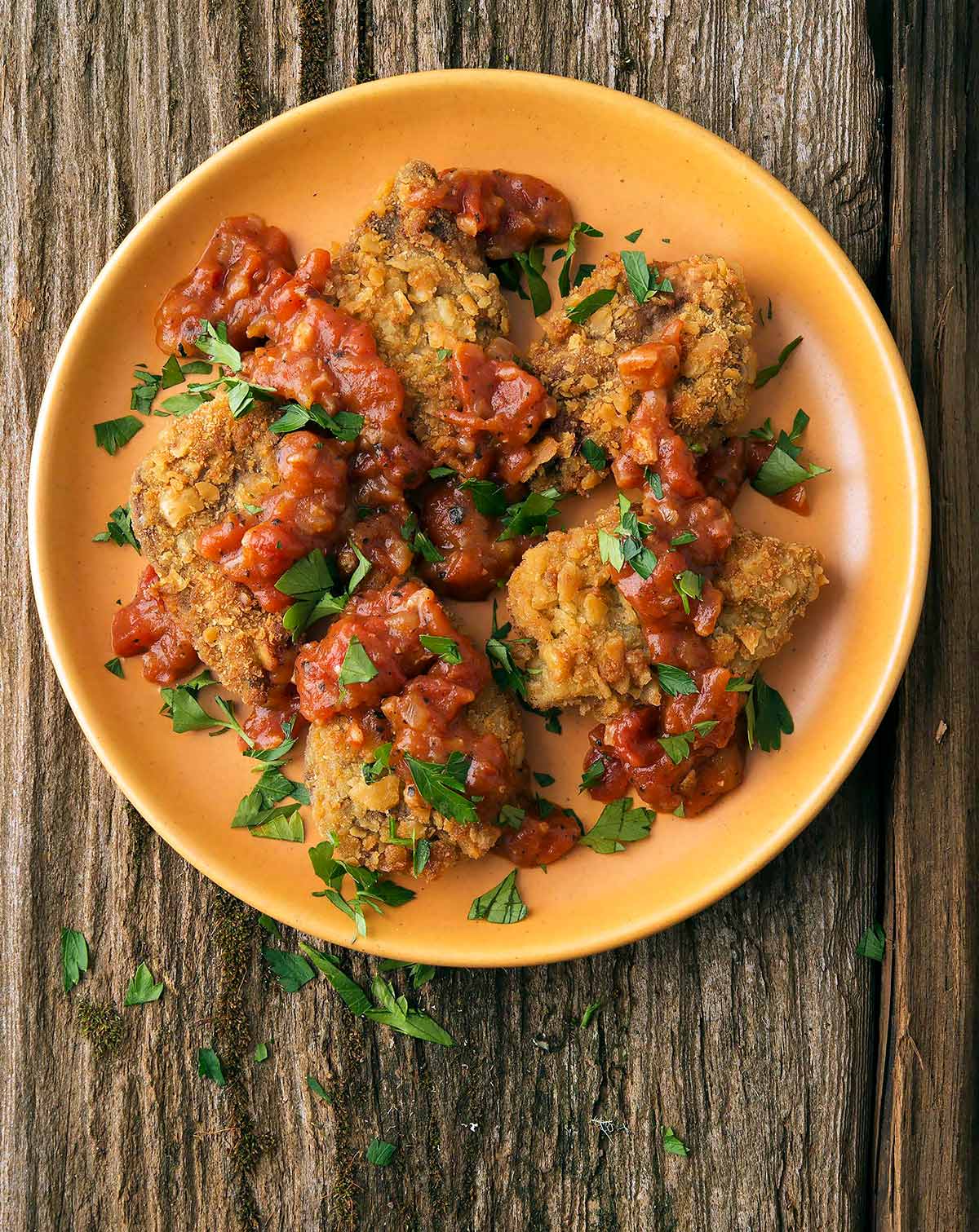 Southern tomato gravy on a plate with chicken fried doves