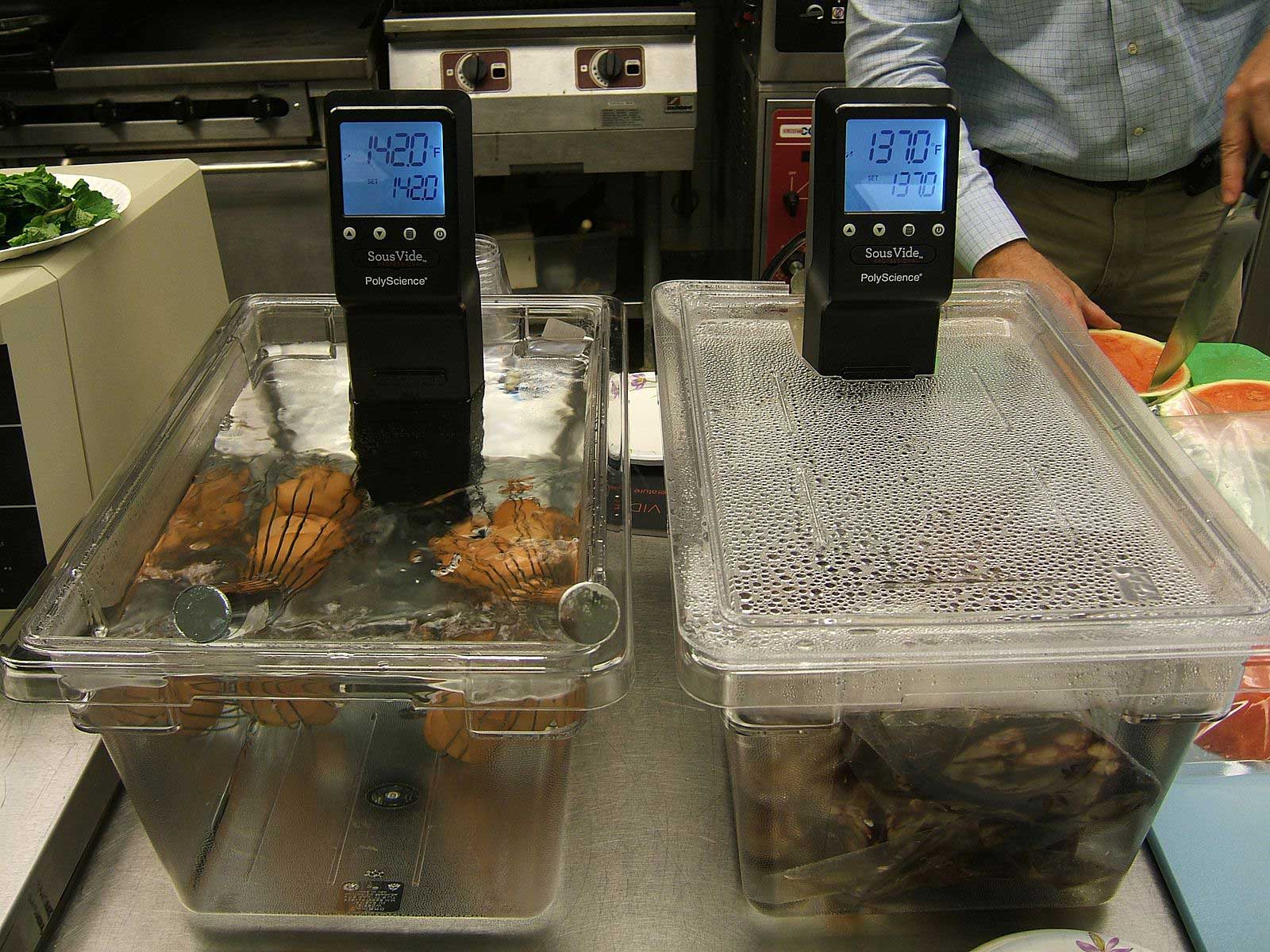Two sous vide machines, cooking potatoes. 