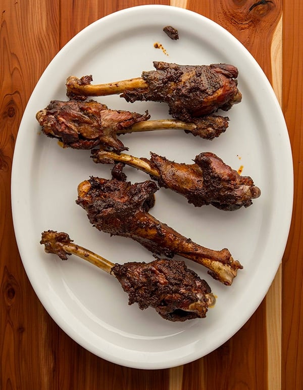 smoked goose wings on a platter