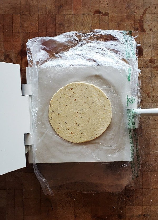 How to make corn tortillas - pressing dough