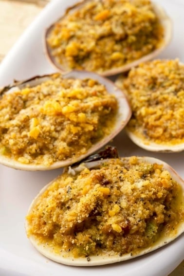 Close up of Rhode Island stuffed clams in their shells.