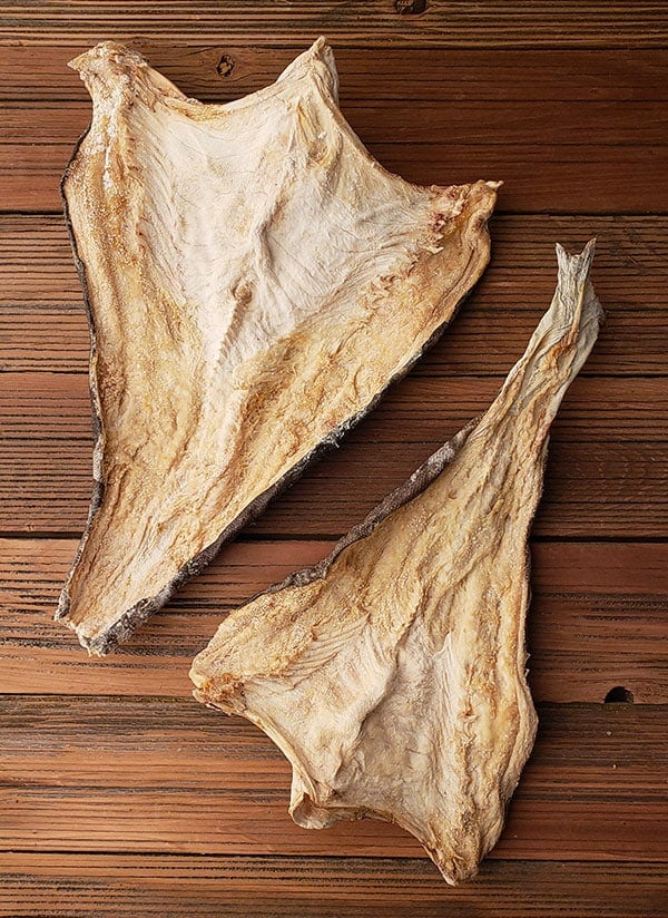 salt cod on a cutting board