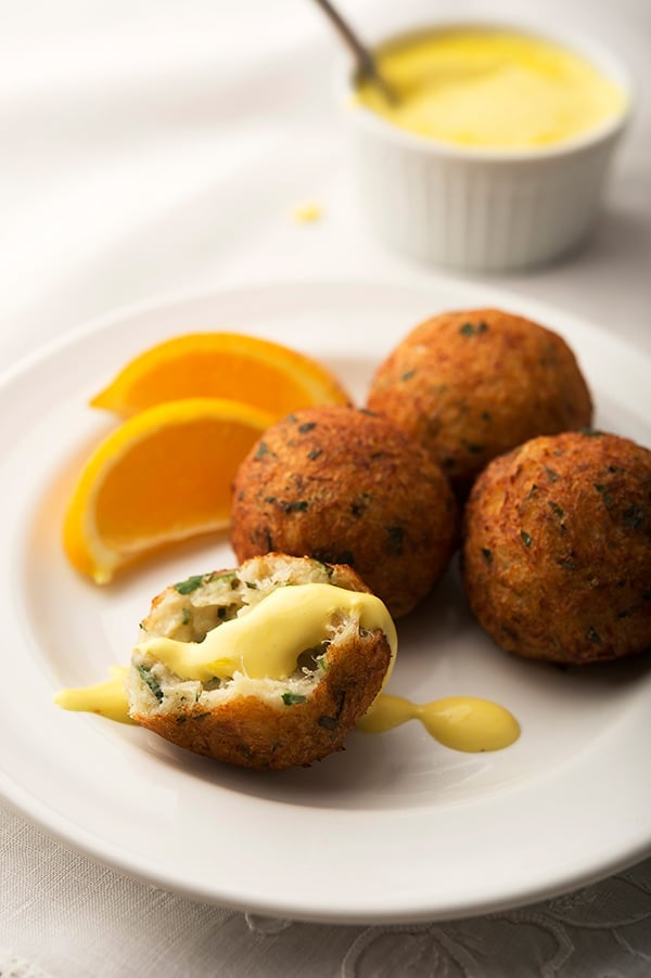 salt cod fritter with aioli on the plate