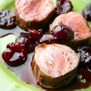 Closeup of wild boar tenderloin with cherry sauce