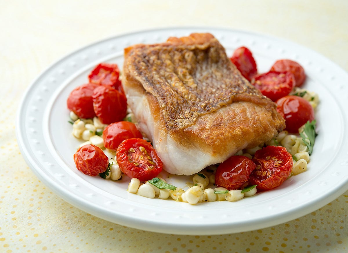 Seared red snapper with cherry tomatoes and corn 