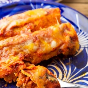 Closeup of enchiladas rojas on a plate