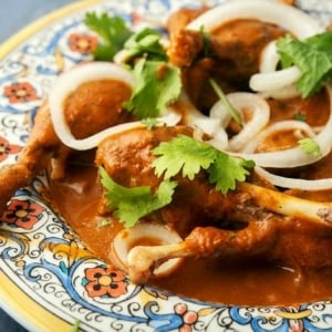 Closeup of a plate of mole coloradito