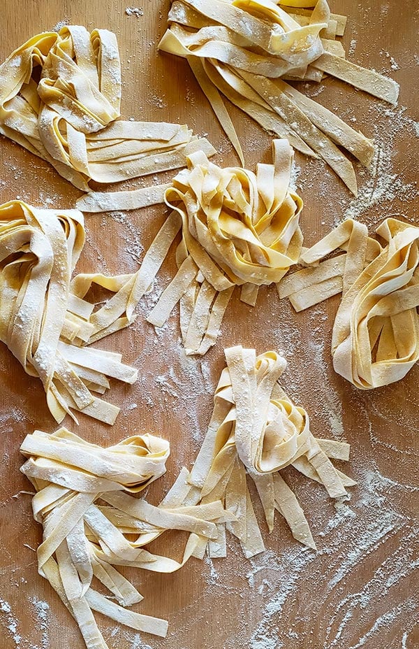 fresh pasta on wooden board