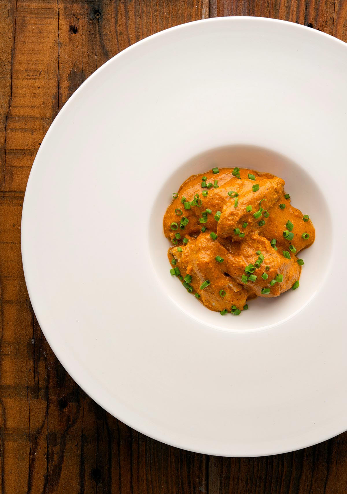 Mexican chirmol sauce with crab in a fancy bowl