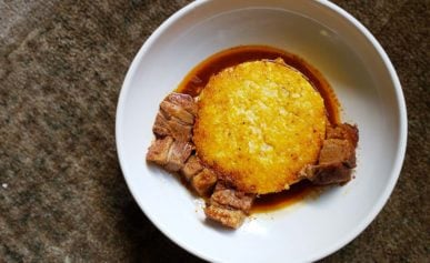 Leftover pork belly with fried hominy grits.