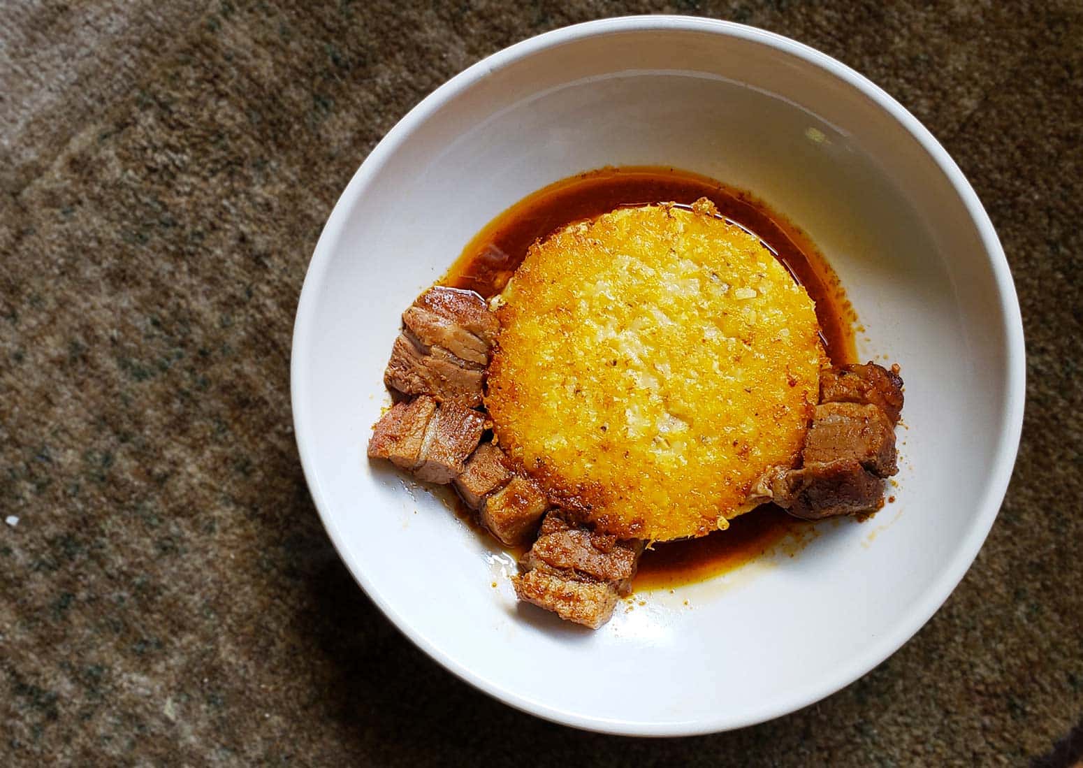 Leftover pork belly with fried hominy grits. 