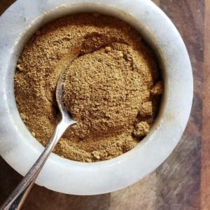 Porcini powder in a mortar and pestle.