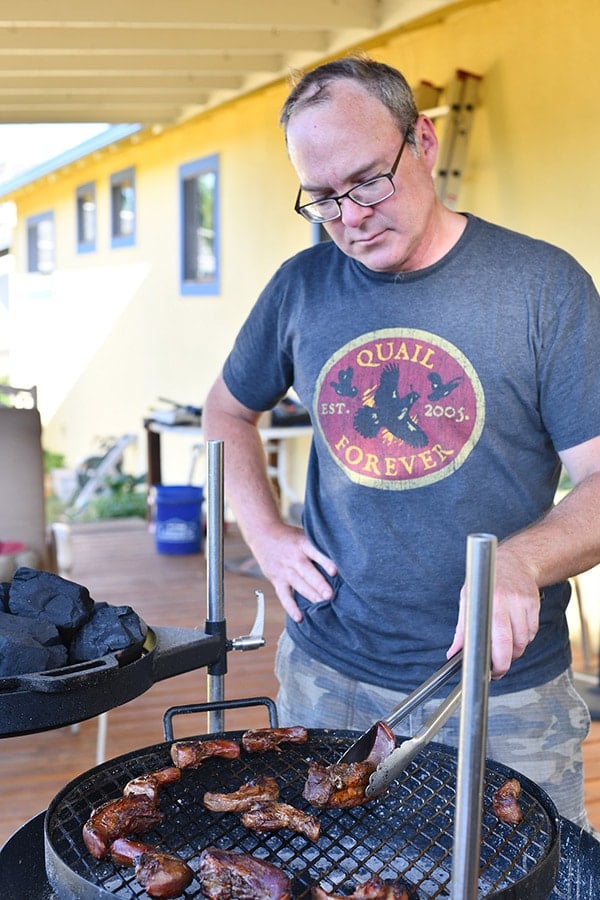 Hank Shaw grilling tongues for tacos