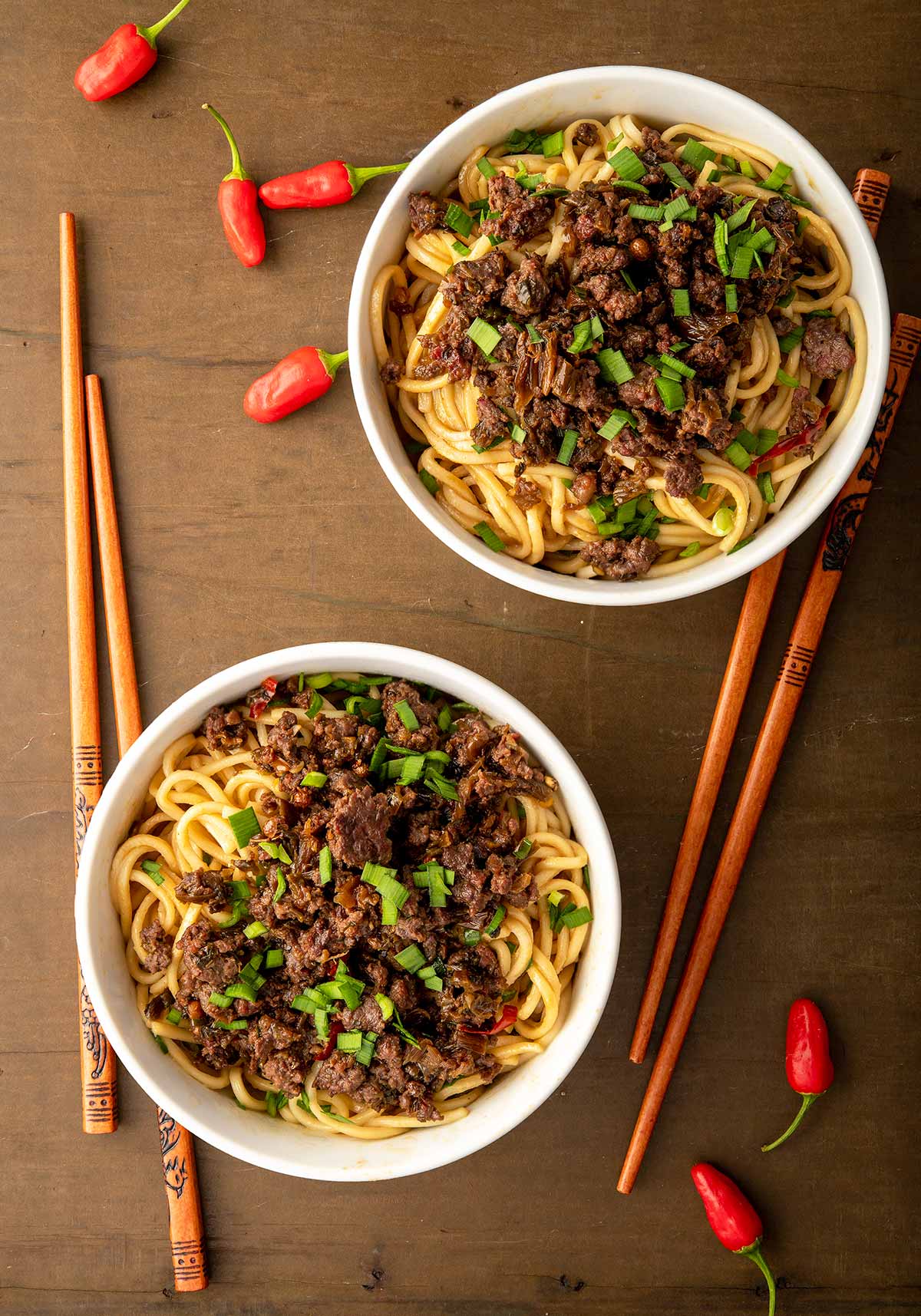 Finished dan dan noodles recipe, with two bowls