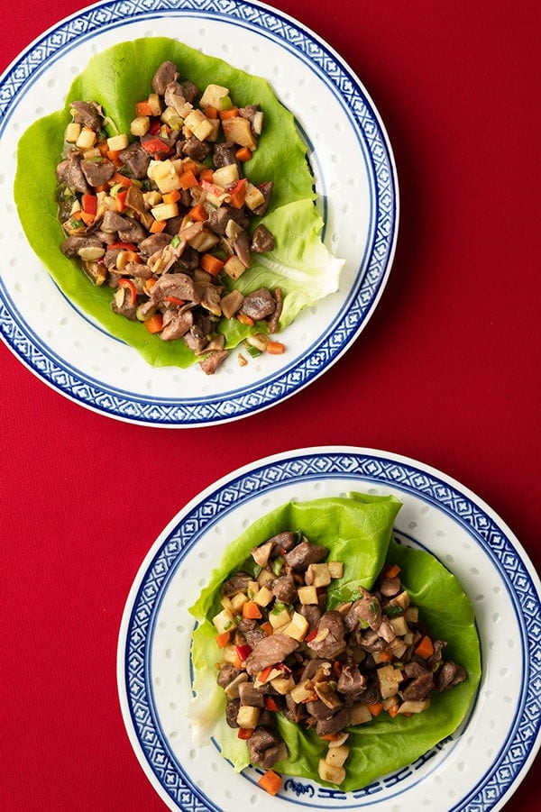 Two servings of Chinese lettuce cups with minced meat