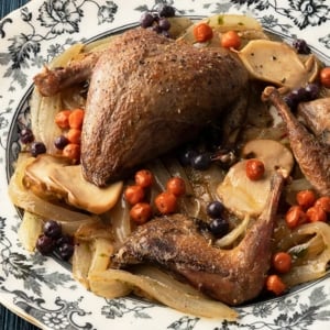 Pan roasted ptarmigan with onions and mushrooms.