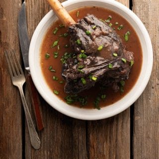 Braised venison shank on a plate