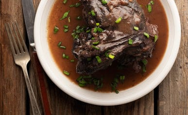 Braised venison shank on a plate