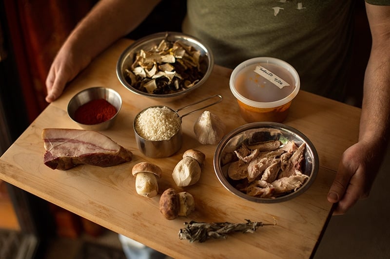 A tray of ingredients for making mushroom rice