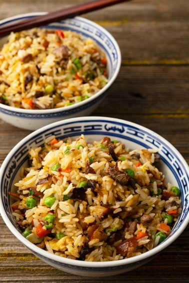two bowls of duck fried rice