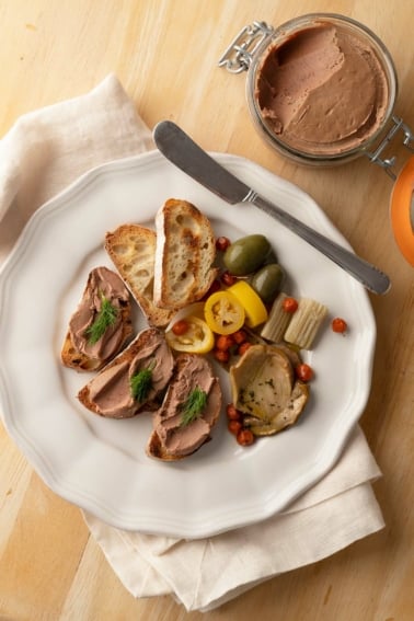 duck liver pate on toast with pickled accompaniments