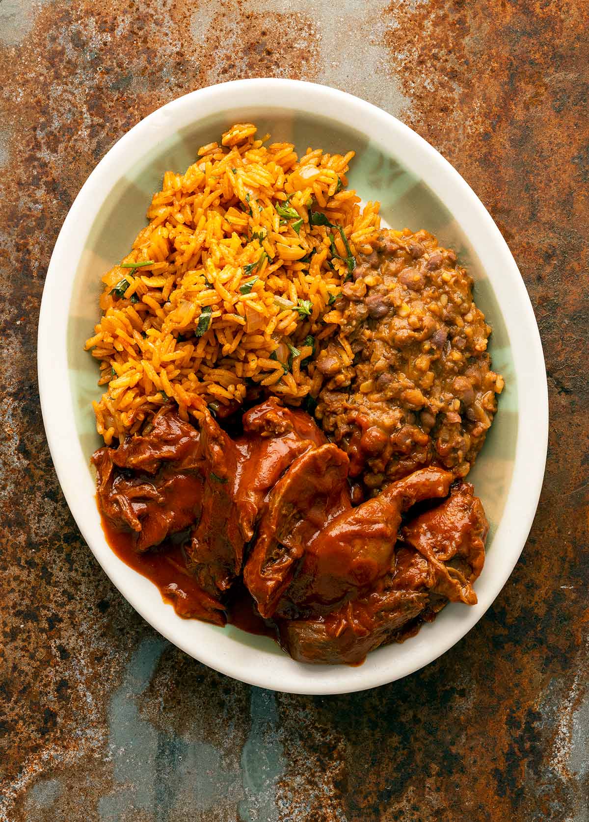 Sonoran carne con chile on a plate with rice and beans