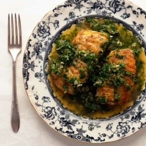 A plate of Spanish green sauce over fish