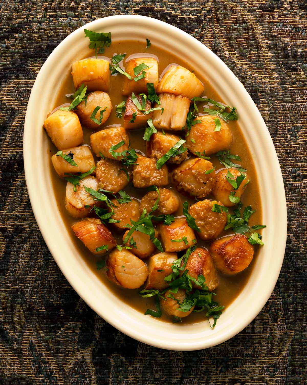 garlic butter scallops on a platter