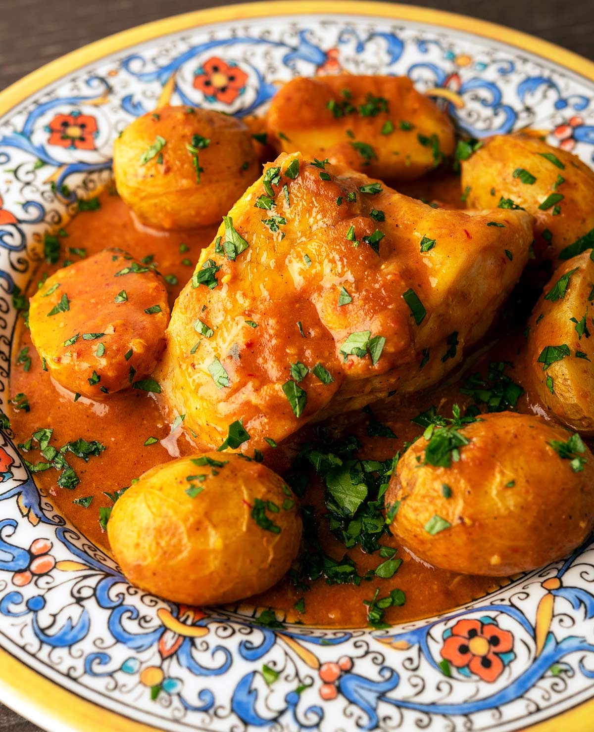 Closeup of Catalan monkfish on a plate with potatoes
