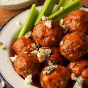 Buffalo Meatballs in a bowl with celery