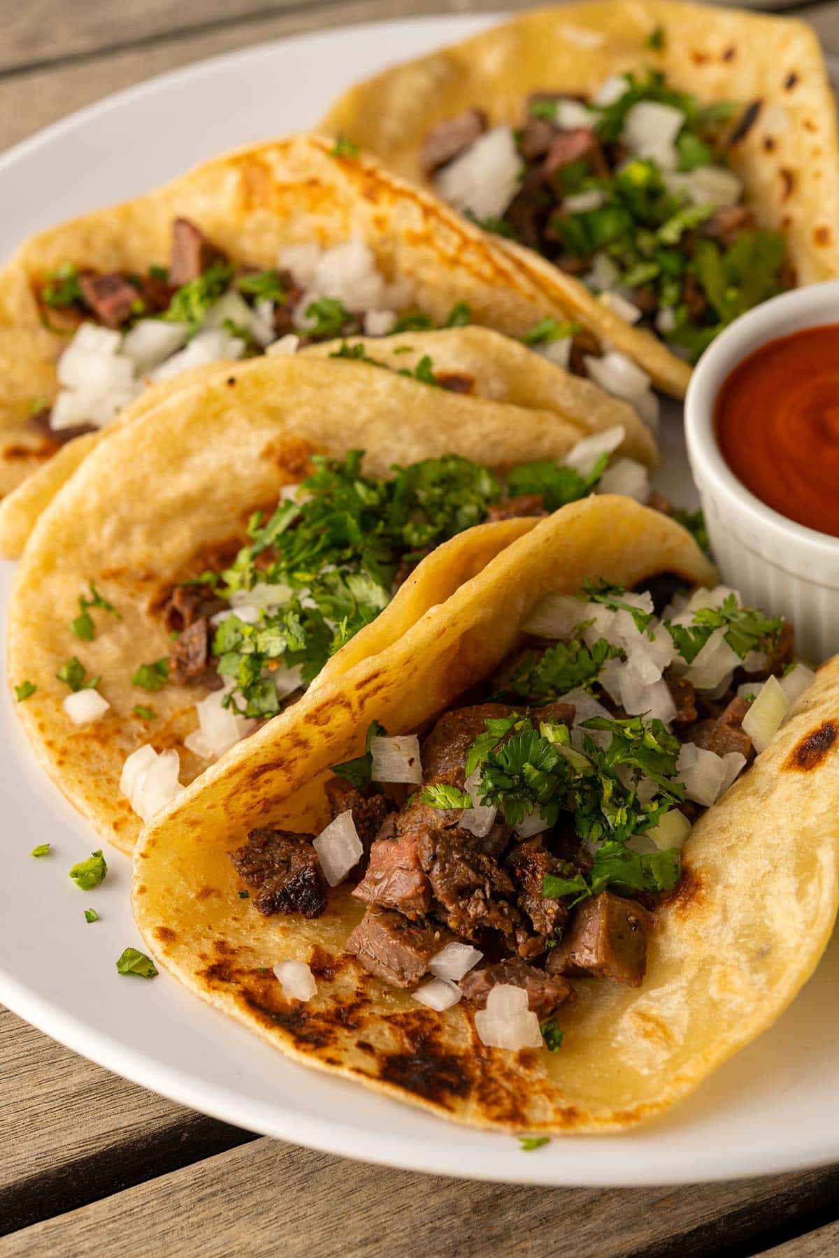 Closeup of a plate of arrachera tacos