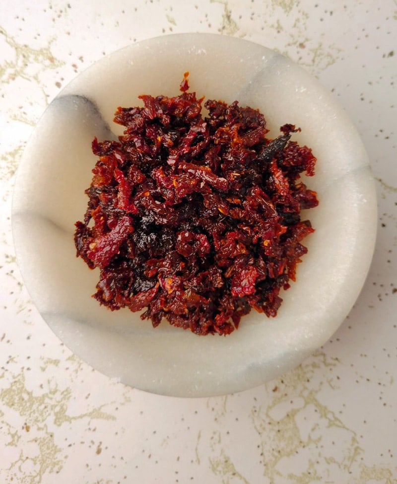 Ground sun dried tomatoes in a bowl