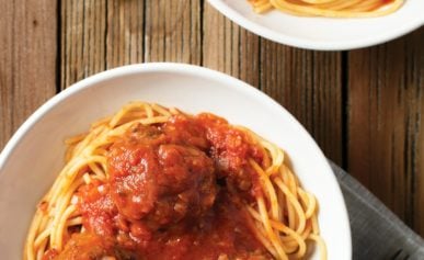 Two bowls of venison meatballs with spaghetti